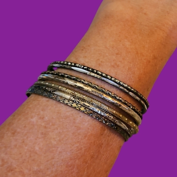 3/$30 Set of Seven Thin Stackable Metal Bangle Bracelets - Picture 1 of 5